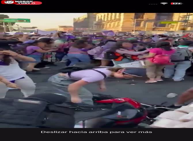 Video :He fights women at a rally and gets arrested